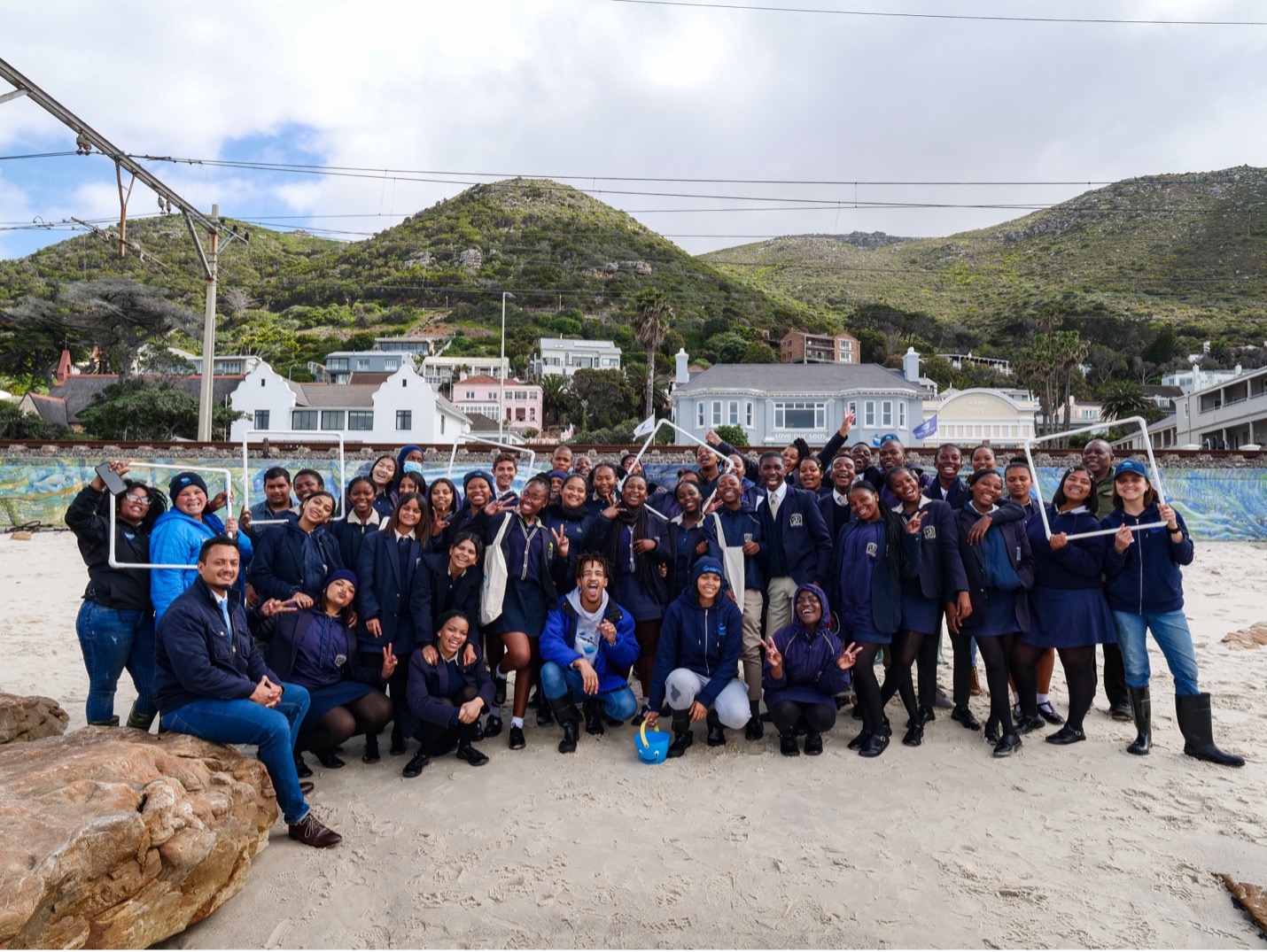 Our dedicated education team in action teaching high school students how to conduct transect surveys of the rocky shore ecosystem. Image by Danel Wentzel.
