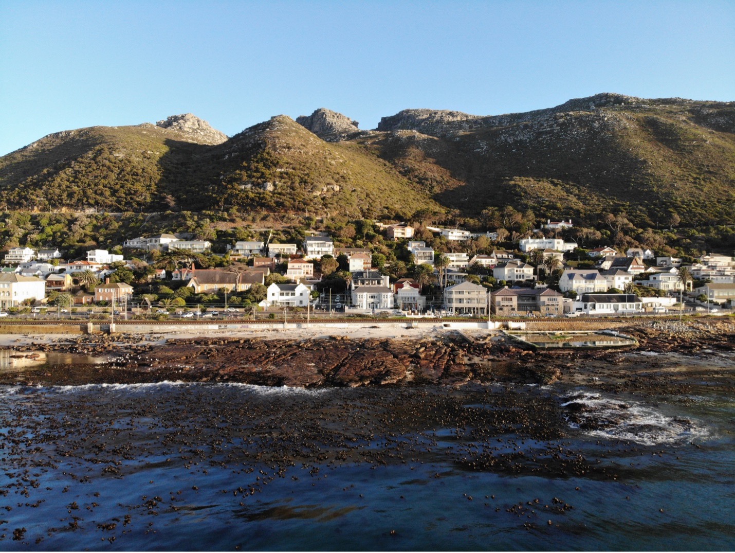 An aerial view of the Dalebrook Marine Protected Area with the beautiful Kalk Bay mountains in the background. Image by Nic Good.
