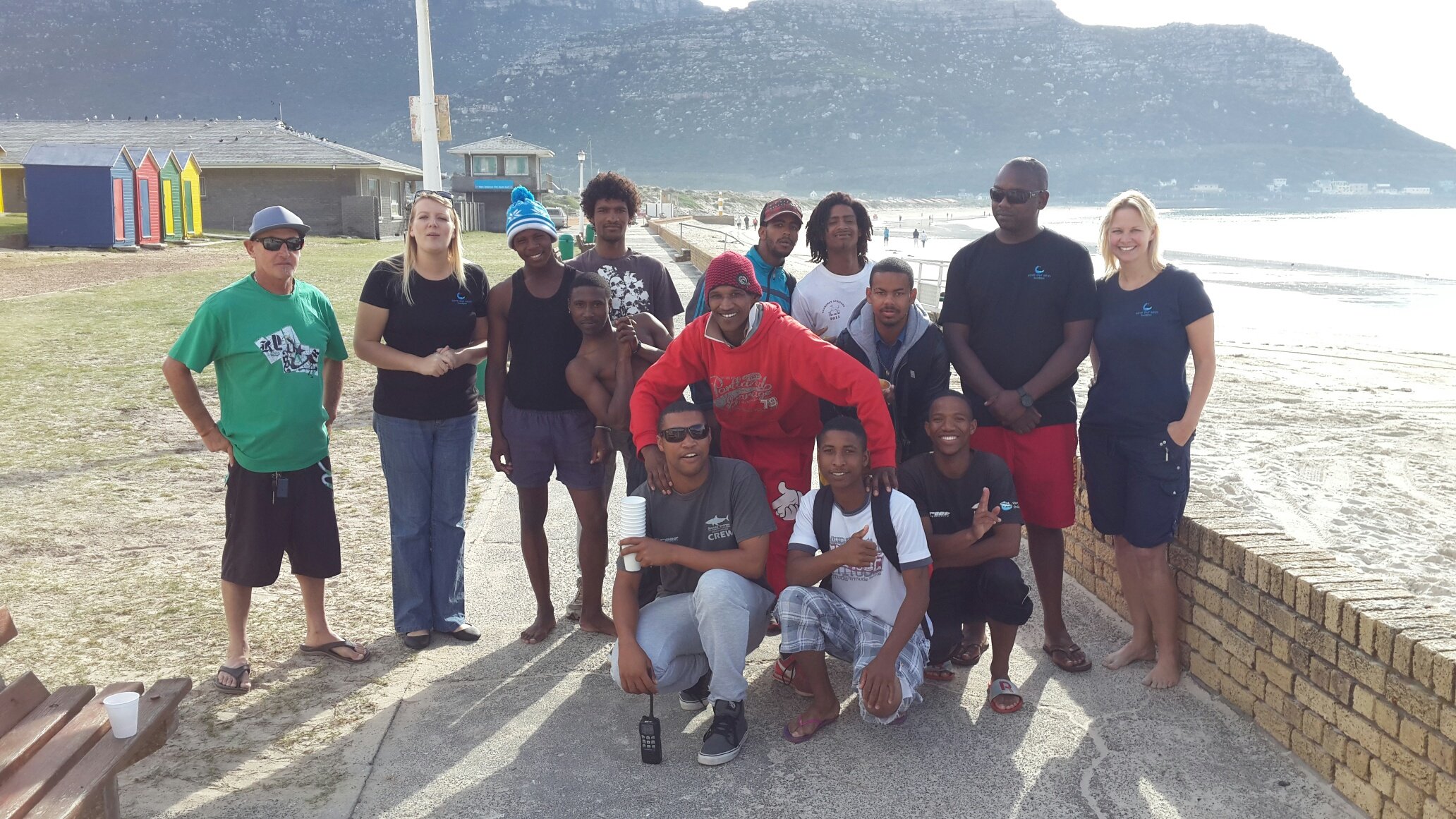The Fish Hoek exclusion net team at their 130th successful deployment, marking the end of the trial. (c) Shark Spotters
