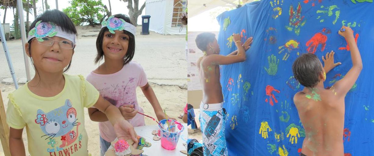 Children enjoying the Academy by the Sea activities of making turtle headbands, painting turtles and doing turtle handprints at the festival's Family Fun Day. Photo: Abi March