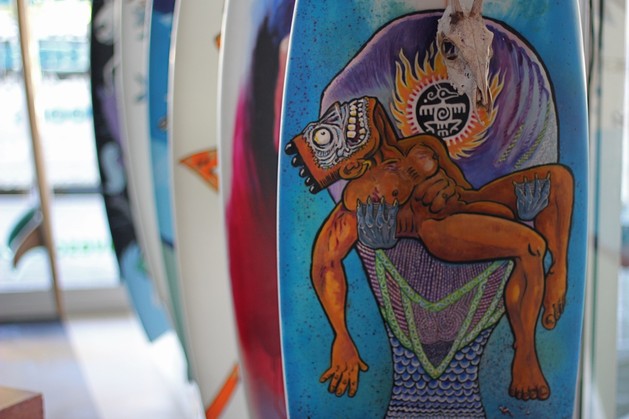 Each of the eleven boards to be auctioned features a unique design. Photo © Jonathan Trusler.
